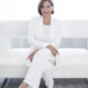 LaNell Silverstein sitting on white couch