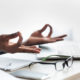 woman meditating in office